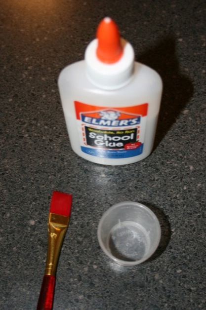 Wait, there's more! Glue, a little cup for glue, and an old paintbrush.